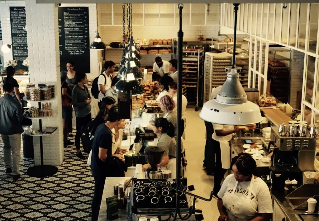 Crowded Spanish café with people talking loudly