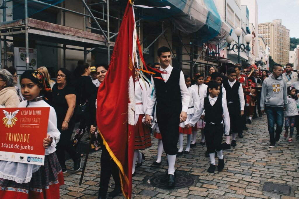 Spanish village Romería tradition with horses and locals.