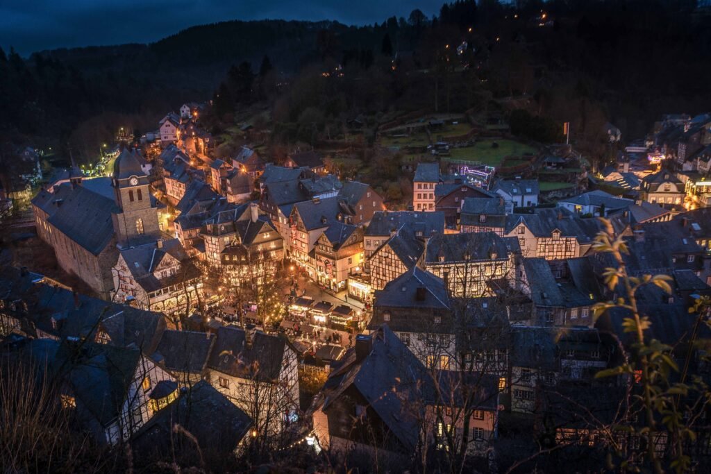 Spanish village festival experience with live music and dancing.